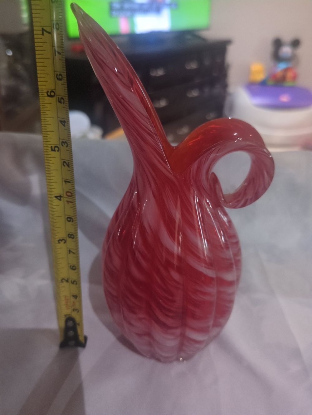 Mid-Century red and white swirl art glass ewer or small pitcher.